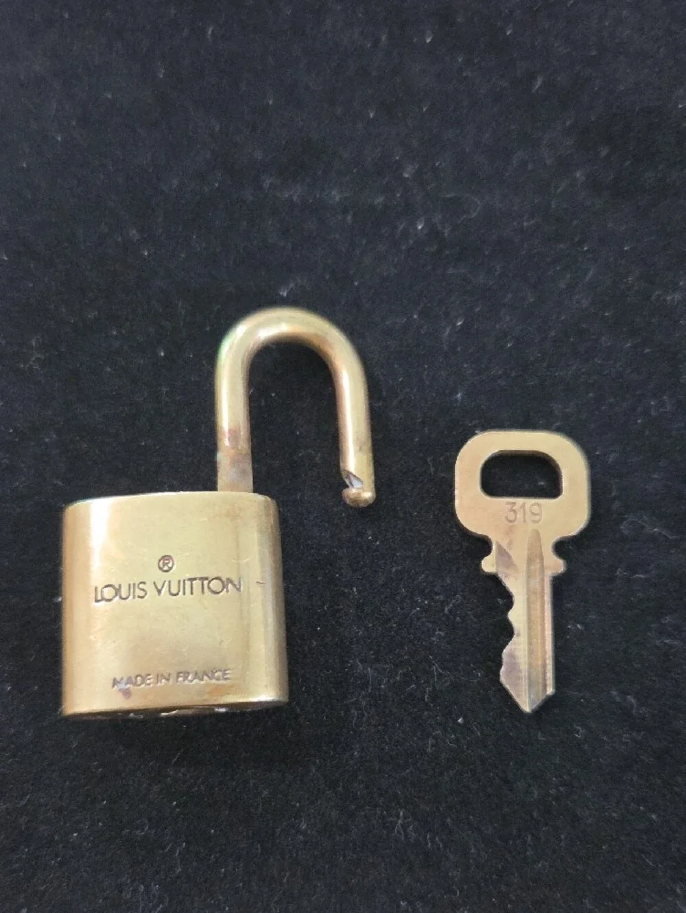 Louis Vuitton Gold Padlock with LV Monogram #319